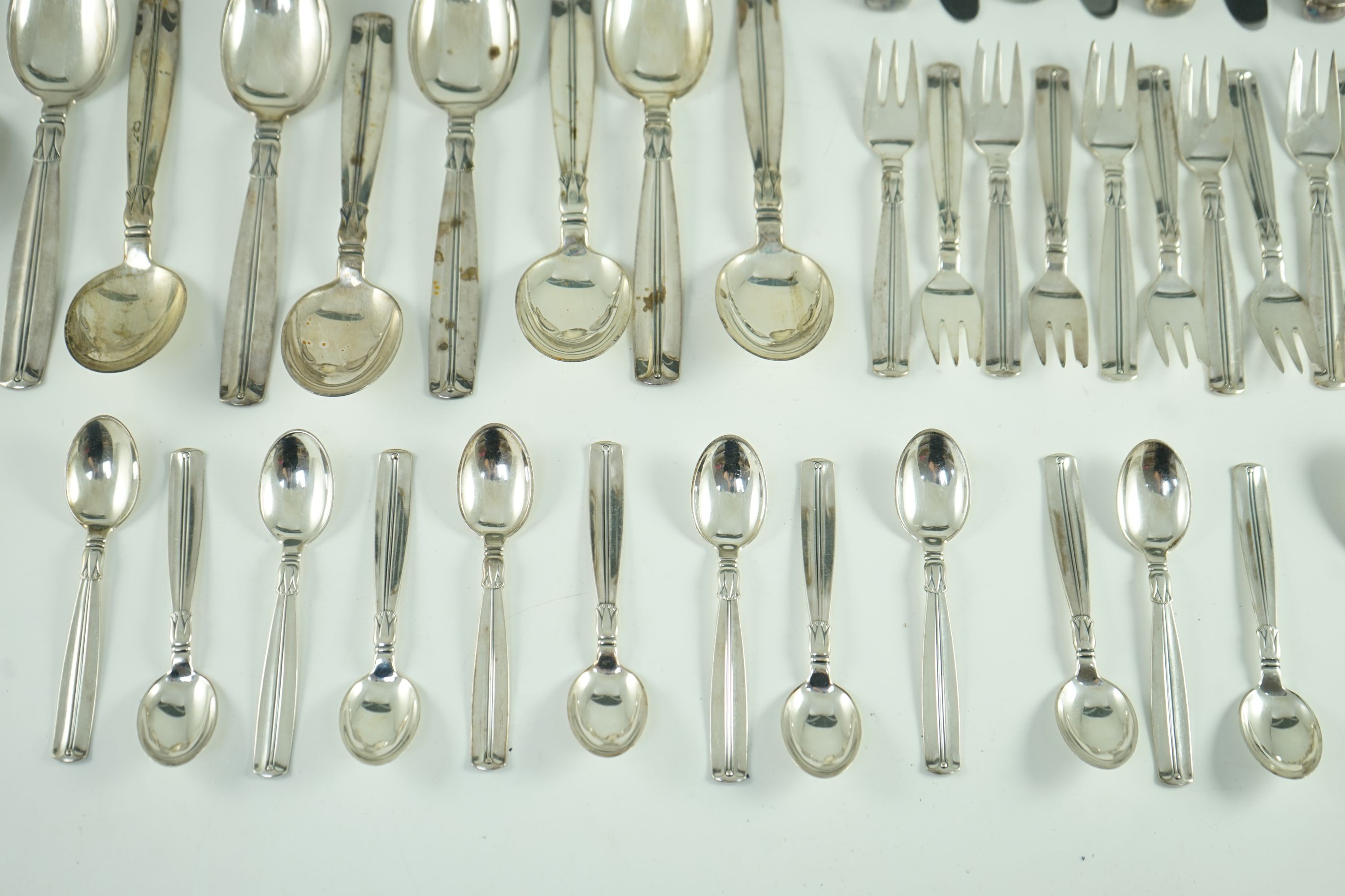 A mid 20th century harlequin part canteen of Danish 830 standard flatware by Broderne, W & S Sorensen